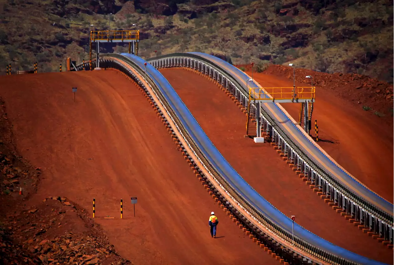 Fortescue profit drops on Iron Bridge impairment charge; co-CEO to step down