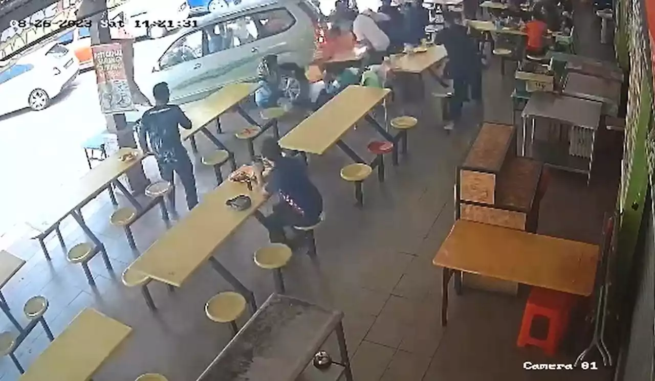 16-year-old boy reverses car into food court