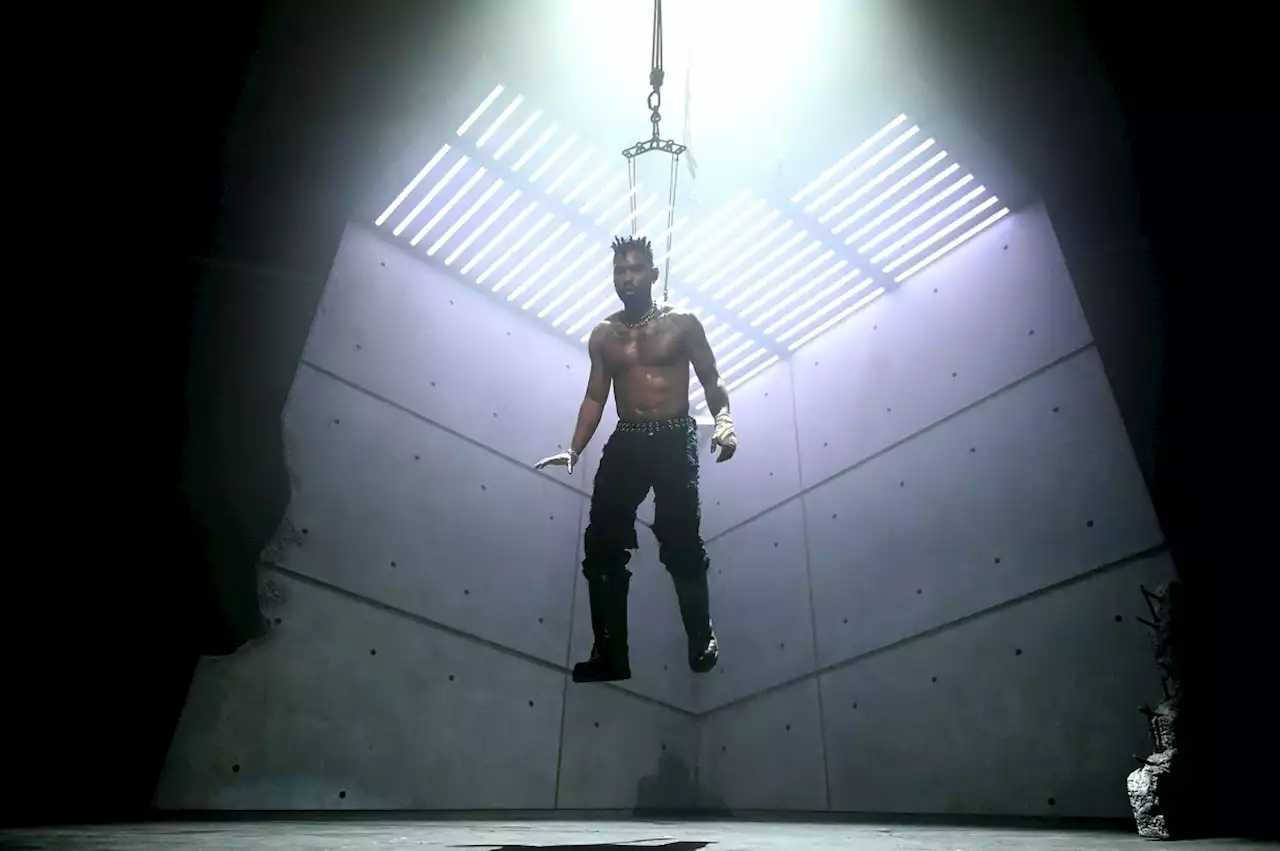 Miguel Suspended in the Air By Hooks on Back Piercing During Show