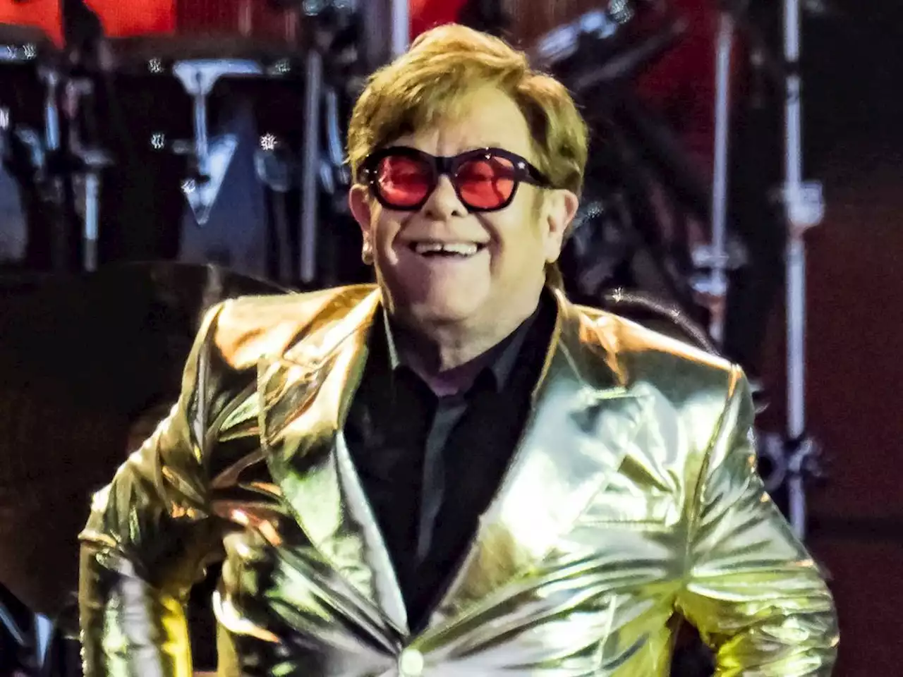 Elton John is back home and in good health after being rushed to hospital