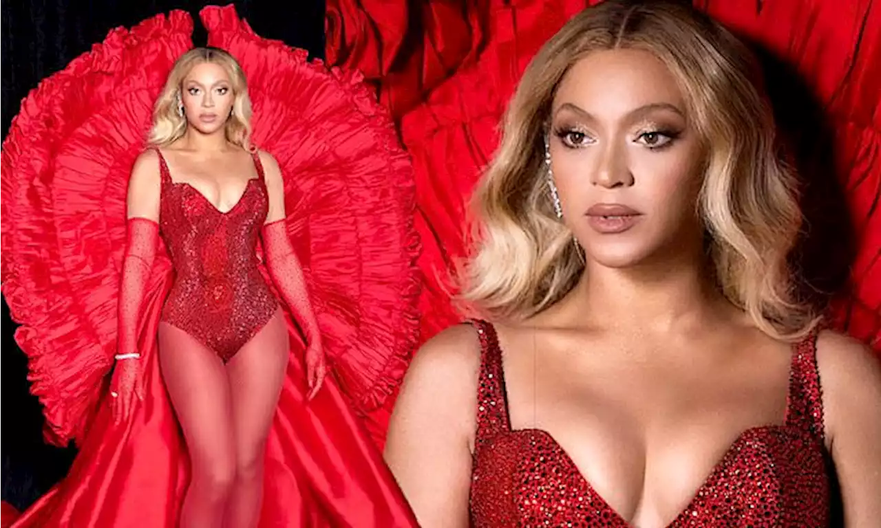 Beyonce slips into a low-cut ruby red leotard to light up Vegas