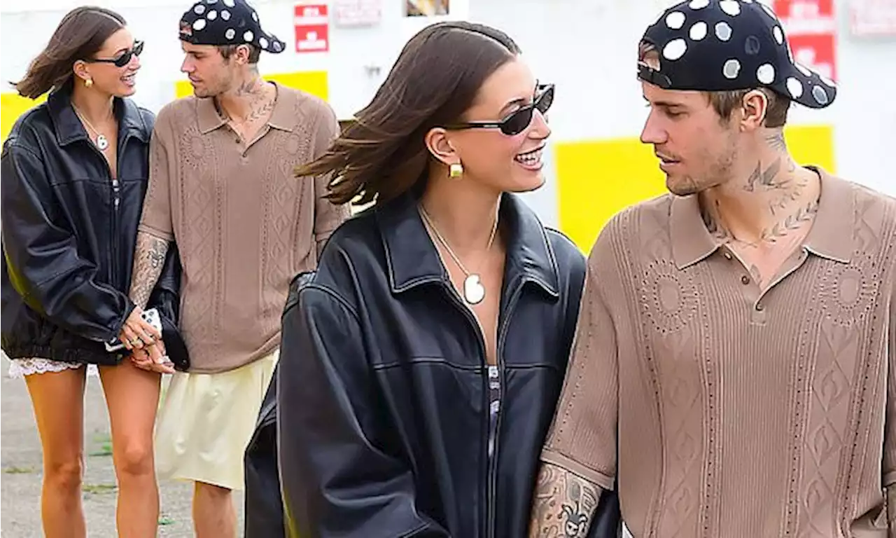 Justin Bieber and Hailey Bieber hold hands as they board helicopter