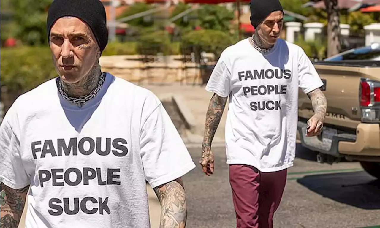 Travis Barker wears 'Famous People Suck' T-shirt