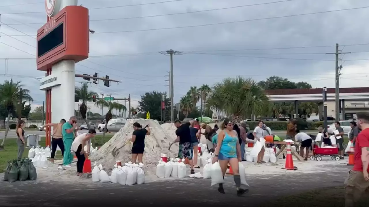 Florida residents shovel piles of sand into bags as Idalia approaches: video