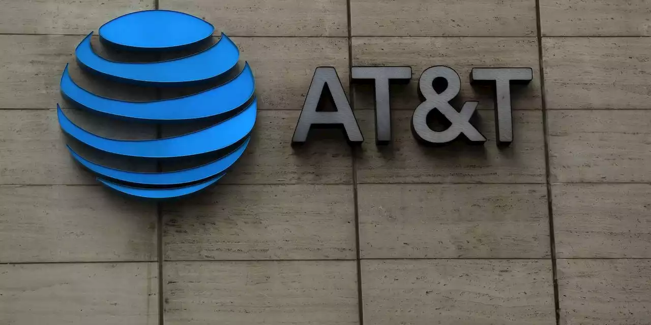 AT&T and Verizon stock lifted by upgrade, and other shares on the move