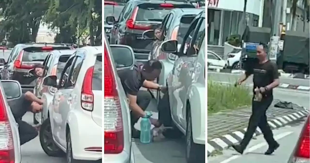 Kind Abang Polis Goes Beyond the Call of Duty to Save Kitten Stuck on a MyVi’s Tyre in Alor Setar