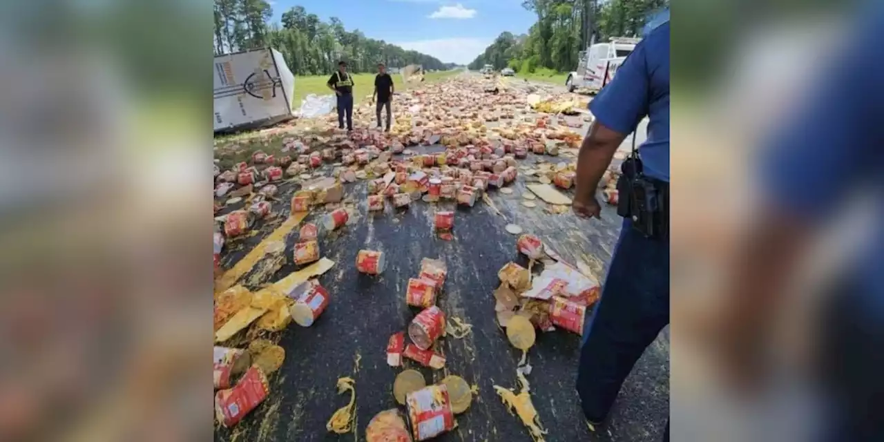 Truck carrying cans of nacho cheese spills on highway