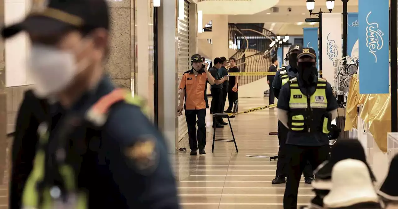 Man rams car onto sidewalk in South Korea and stabs people; at least 14 hurt