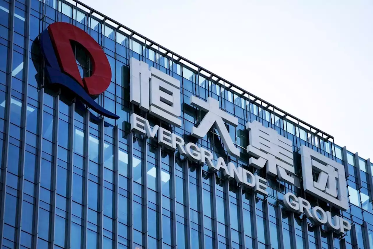 Evergrande services group shares plunge as trading resumes