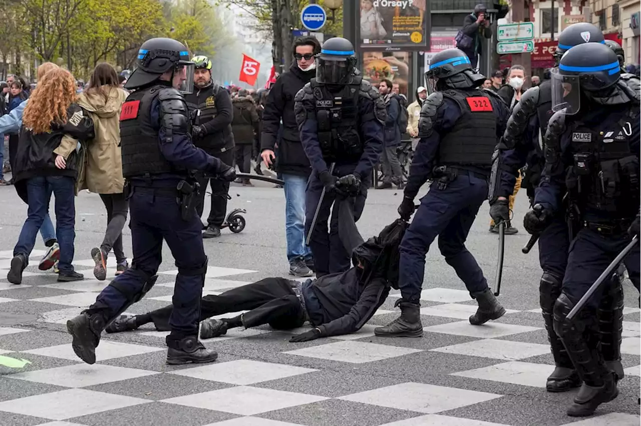 French police officer to remain in custody over alleged violence