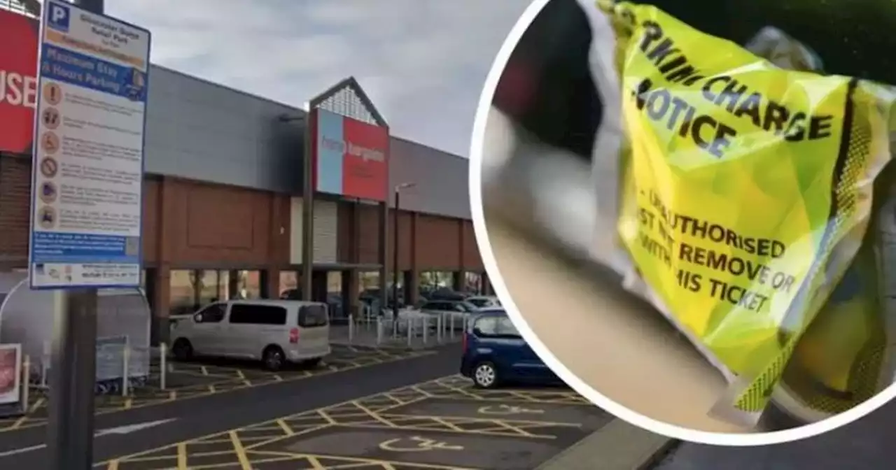 Shoppers hit with £100 fine by parking officer 'hiding behind bush'