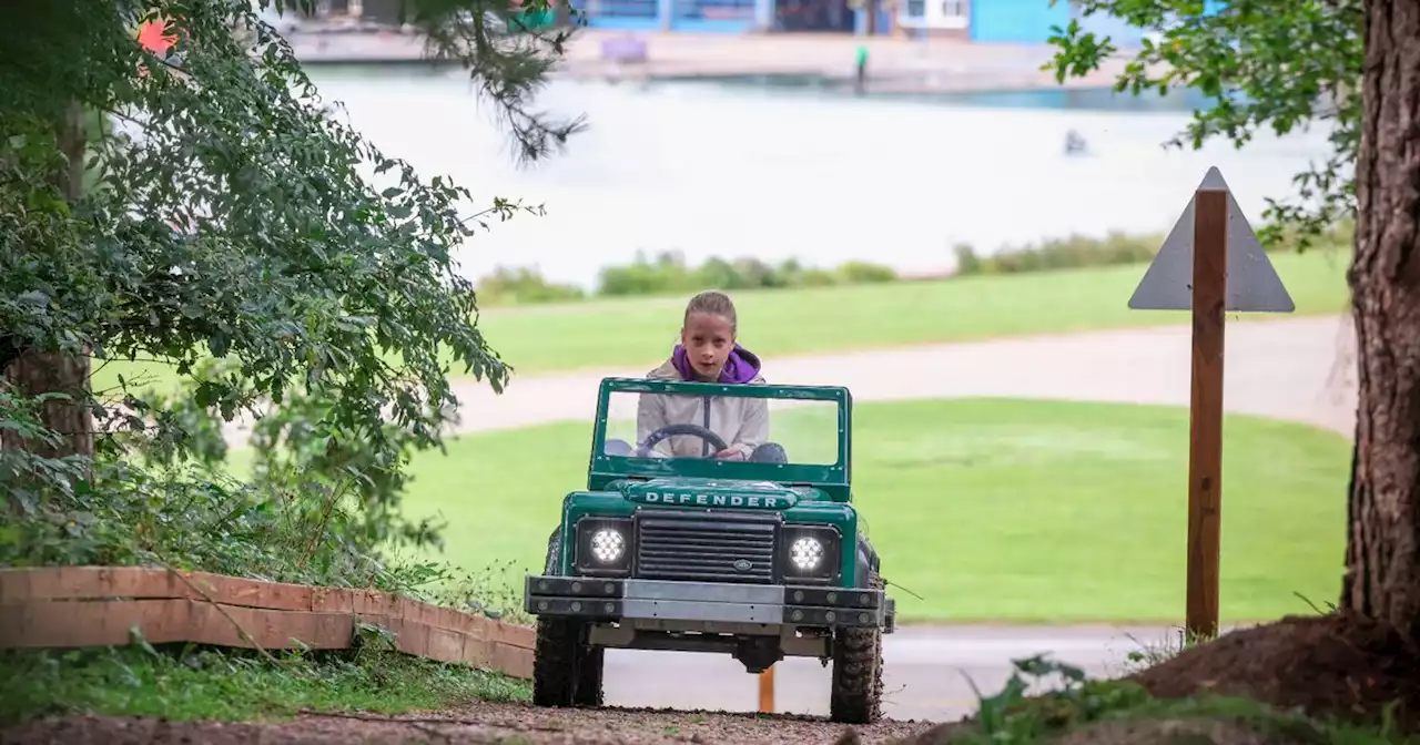 Kids are loving driving mini Land Rovers at country park