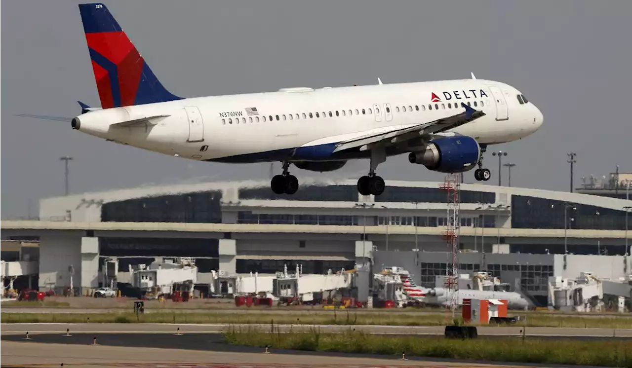 Passenger arrested on Delta flight after cutting self, flight attendant, authorities say