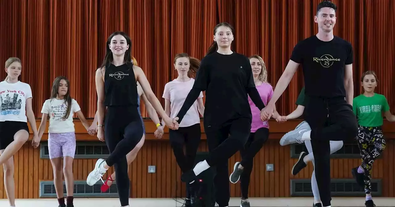 NI's Riverdance stars pass on tips to budding Irish dancers from Ukraine