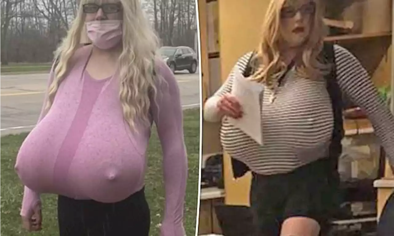 Trans teacher in new video walking with giant Z-cup prosthetic breasts