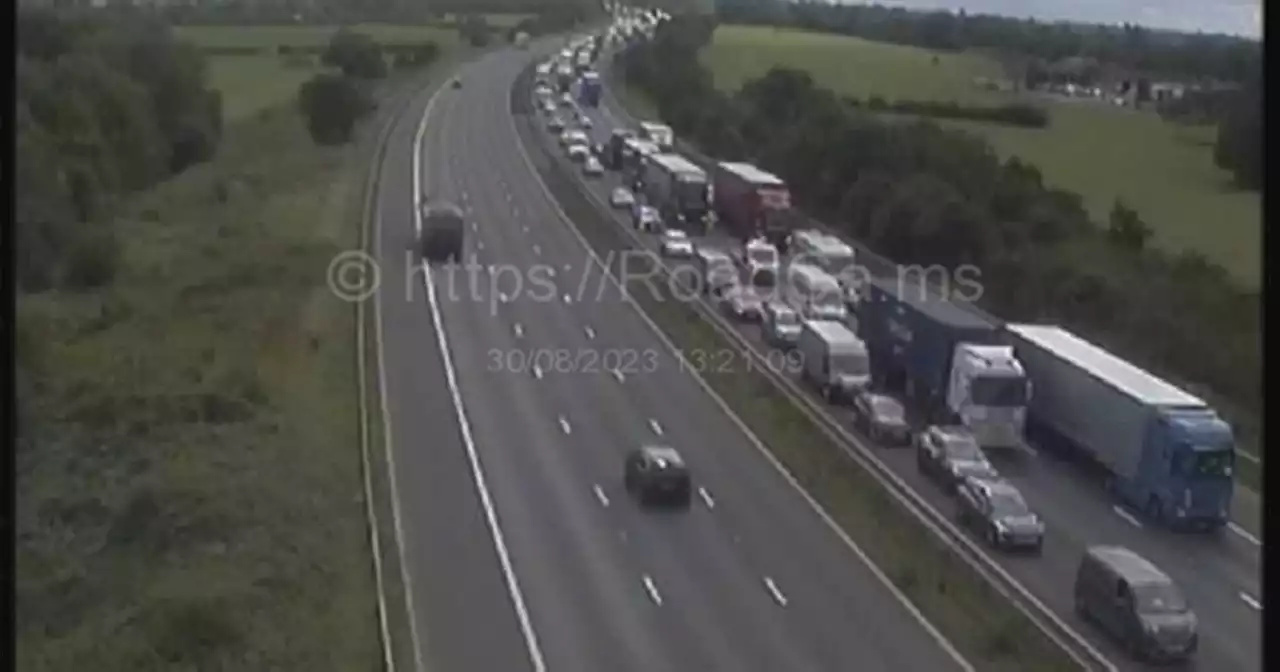 60 minute delays and six mile queues after M1 crash