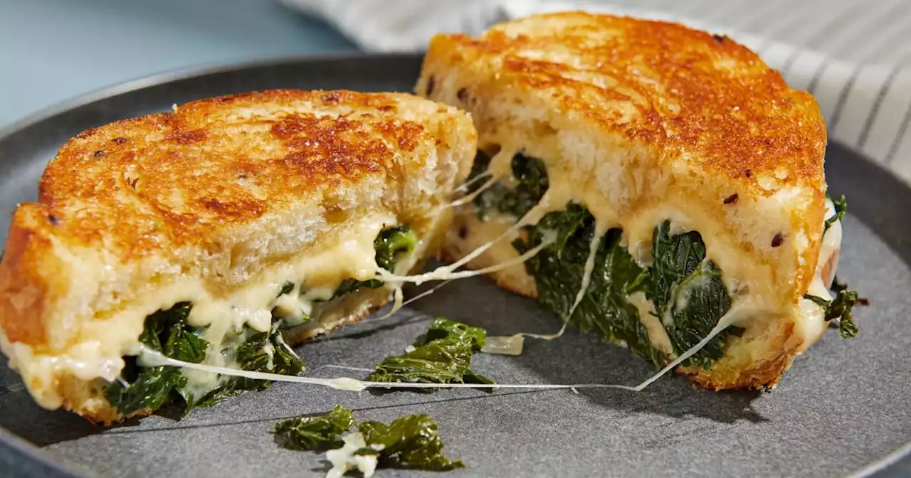 Leafy greens go decadent in this gloriously messy grilled cheese