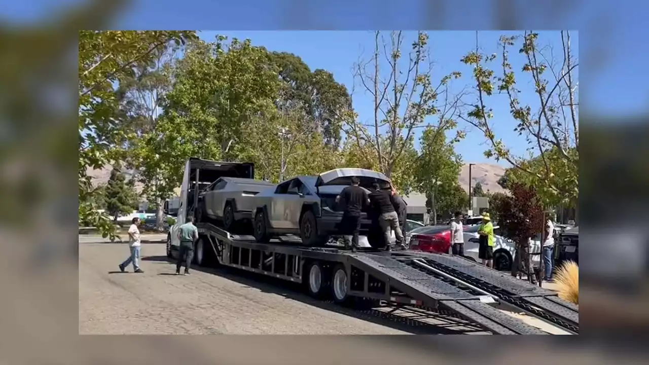 Tesla Cybertruck Spotted With Frunk Open On Semi Car Hauler