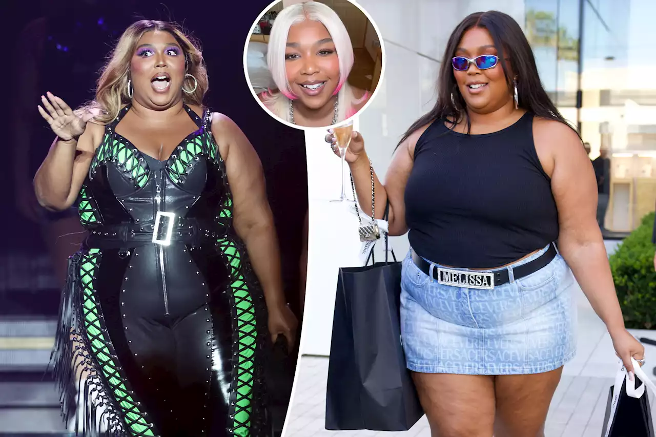 Smiling Lizzo debuts blond and pink bob mullet amid sexual harassment suit