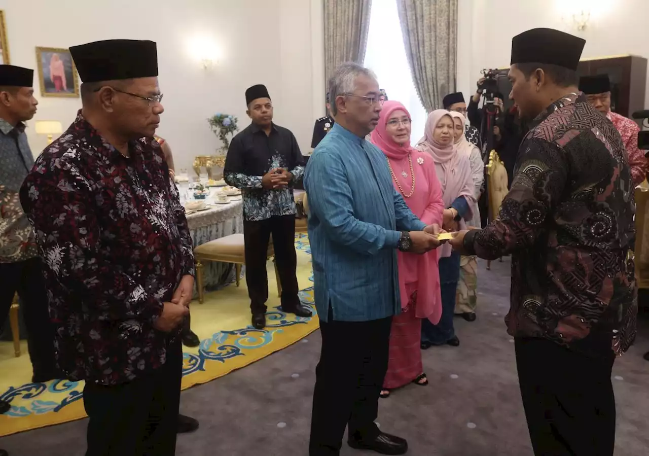 King, Queen attend high-tea reception to commemorate Lahad Datu heroes