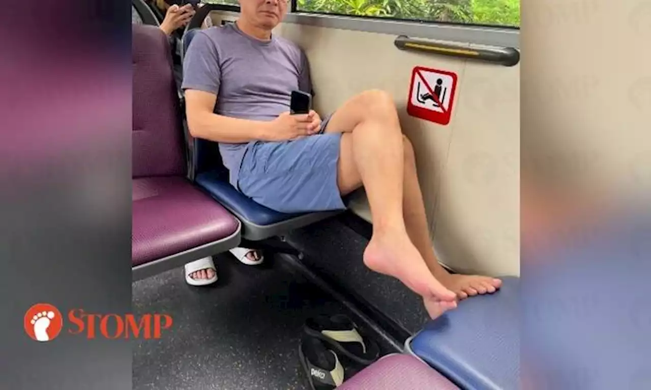 Man allegedly 'rains blows' on Stomper for taking photo of him with his bare feet on bus seat