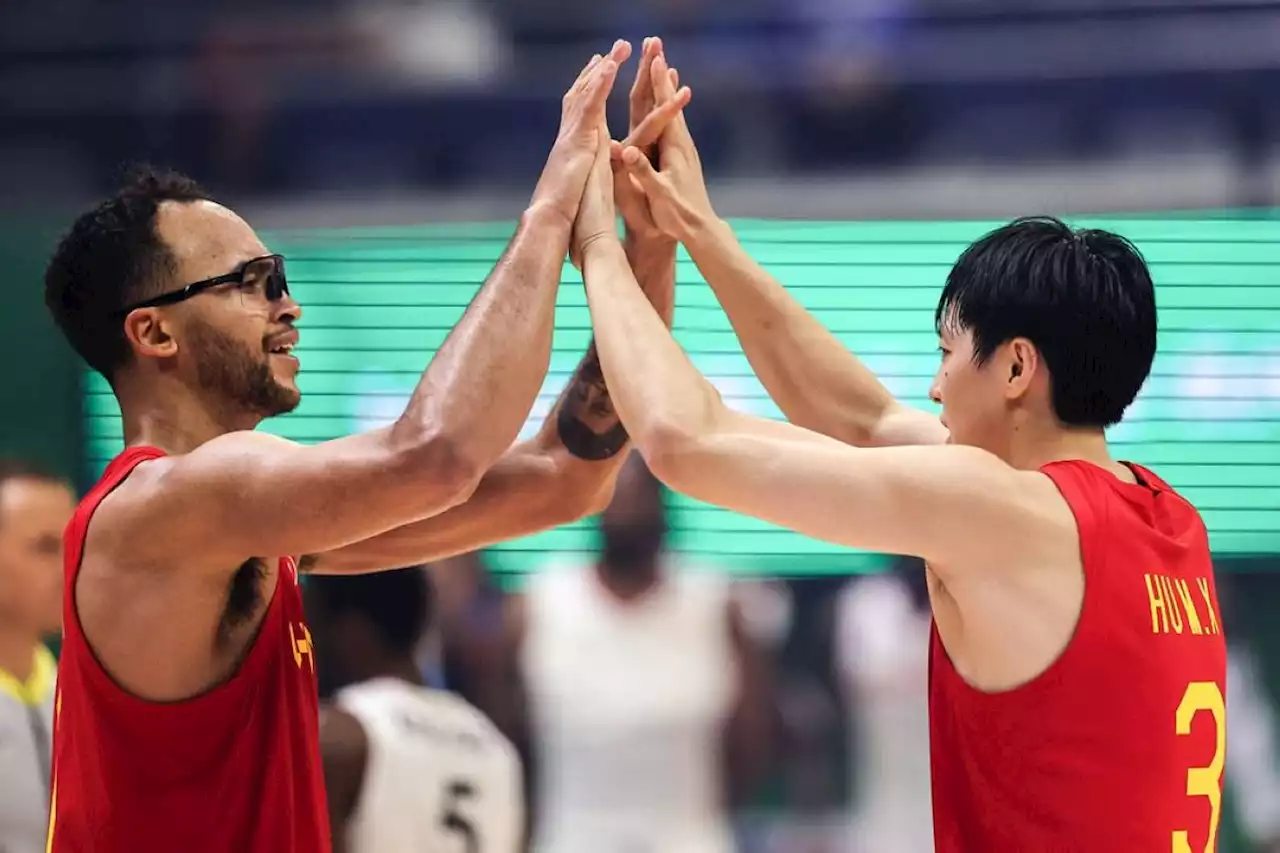 China downs Angola for its first win in FIBA World Cup