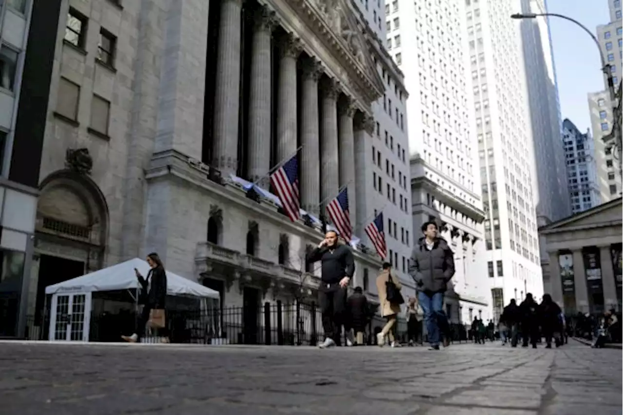Wall Street slips as its big rally cools some more
