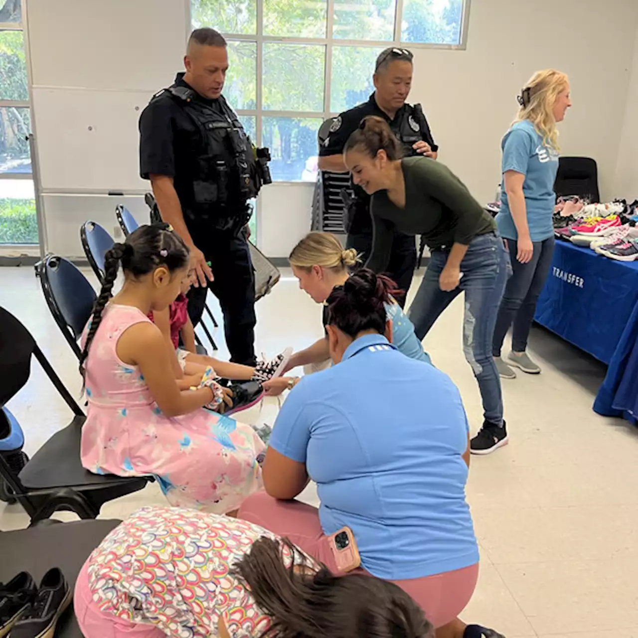 Dallas Police, Energy Transfer provide hundreds of kids with back-to-school shoes - KRLD News