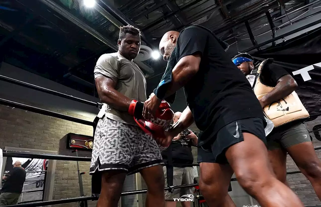 Mike Tyson pictured in camp with Francis Ngannou as they prepare to cause Tyson Fury upset