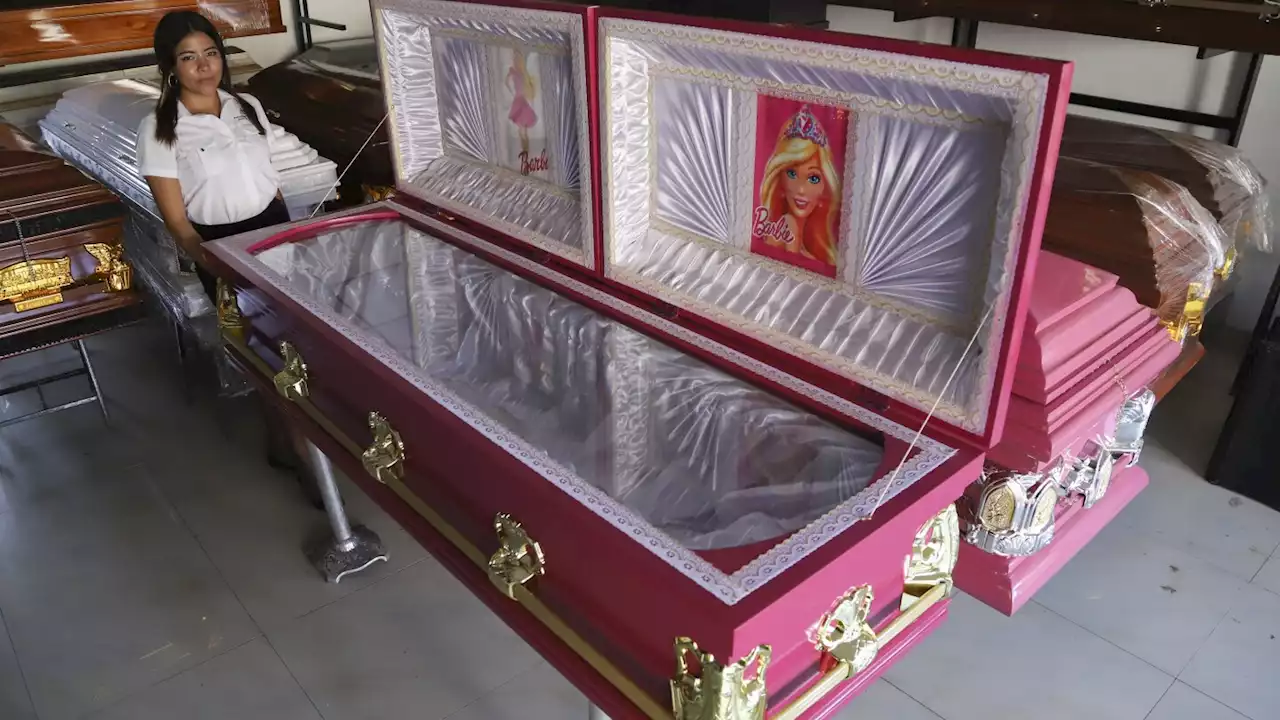 A funeral home in El Salvador offers pink coffins with Barbie linings