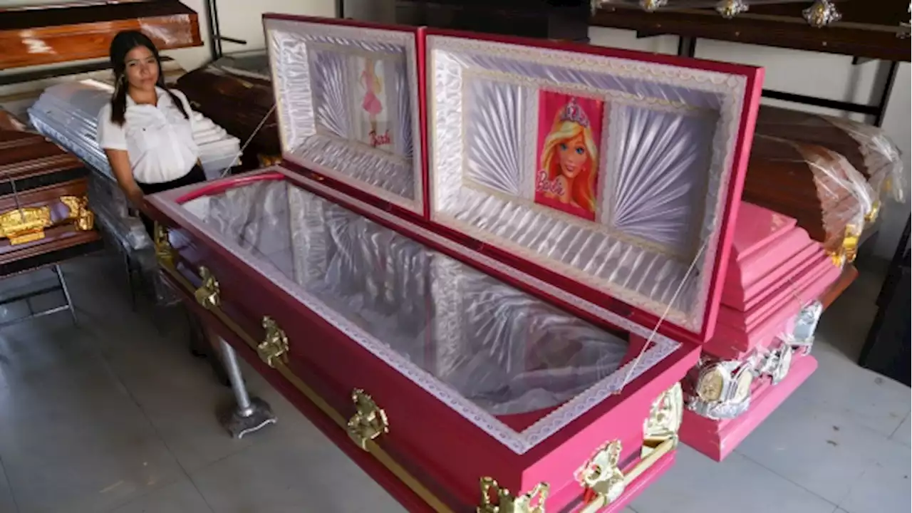 A funeral home in El Salvador offers pink coffins with Barbie linings