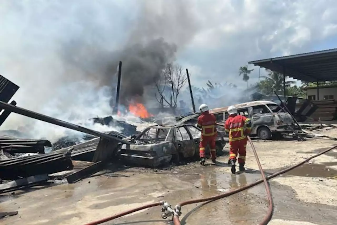 Dozens of vehicles, three buildings razed in Putatan fire