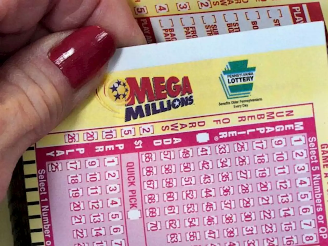 Mega Millions jackpot rises to record $1.55 billion for Tuesday's drawing