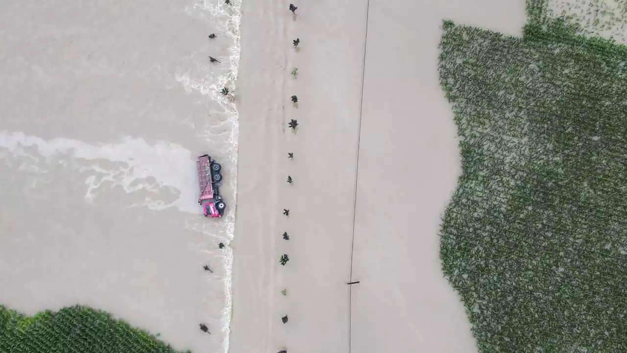 More people go missing and thousands are evacuated as northeast China is hit by more floods