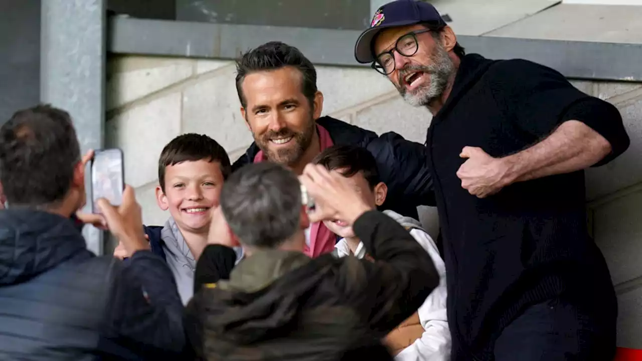 Wrexham co-owners Ryan Reynolds and Rob McElhenney take Hugh Jackman to soccer match