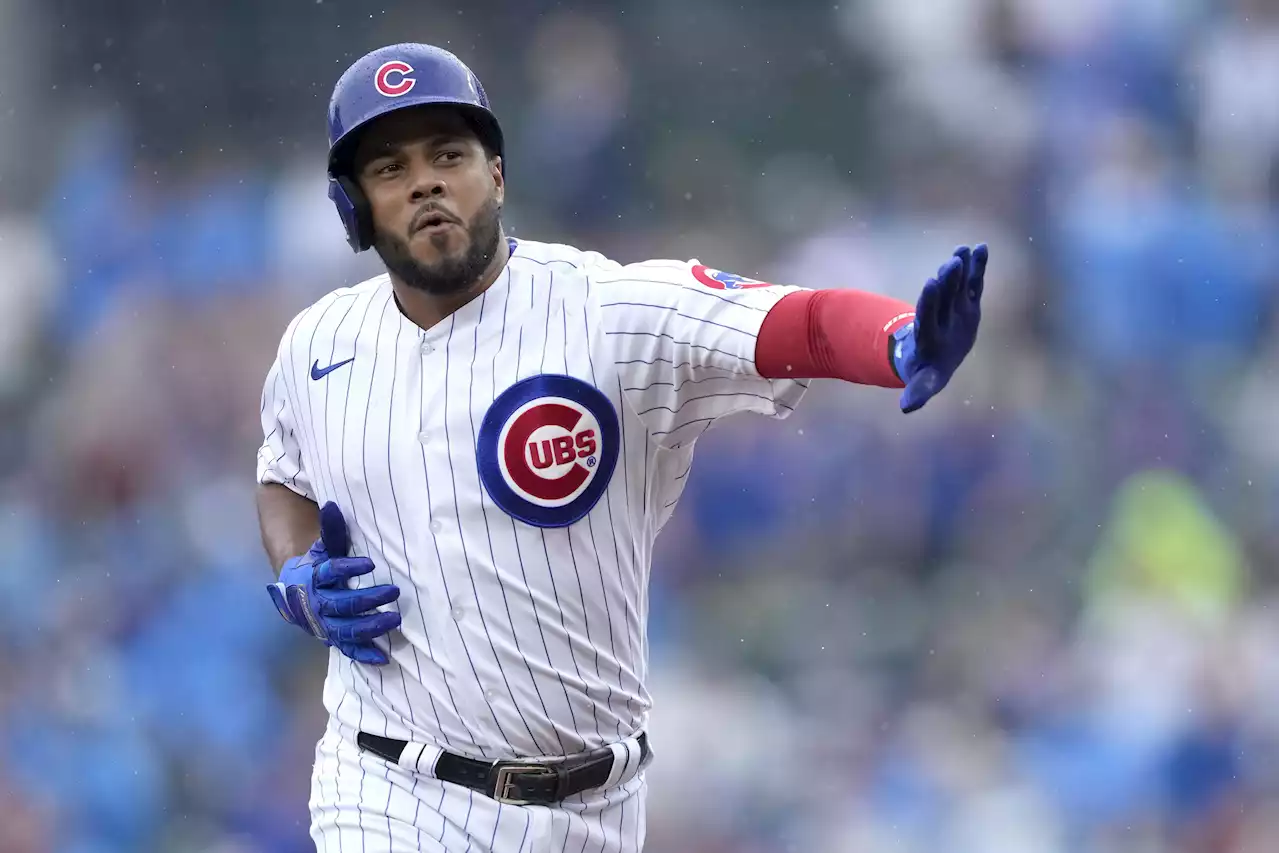 Cubs hang on to edge Braves 8-6