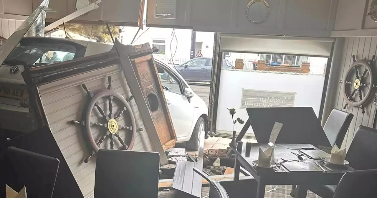 Carnage as reversing car ploughs into restaurant window