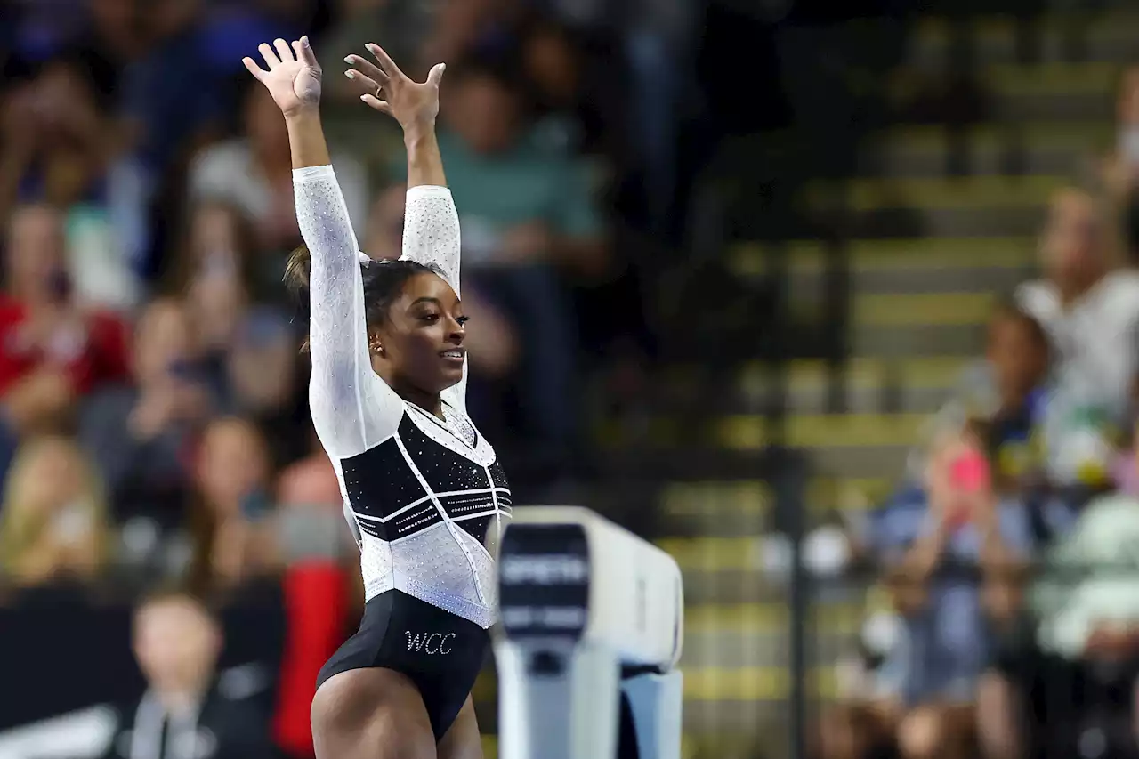 Simone Biles dazzles in her return following a two-year layoff to easily claim the U.S. Classic.
