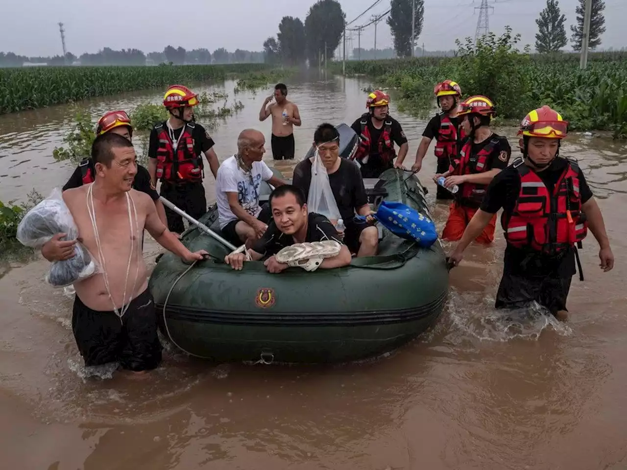 More people go missing and thousands are evacuated as northeast China is hit by more floods