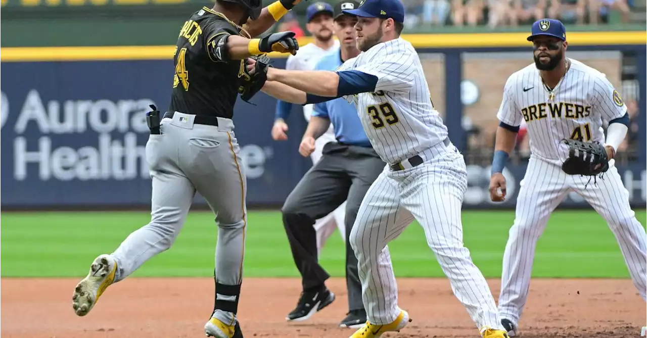 Brewers catch Pirates in 9th, beat them in 10th