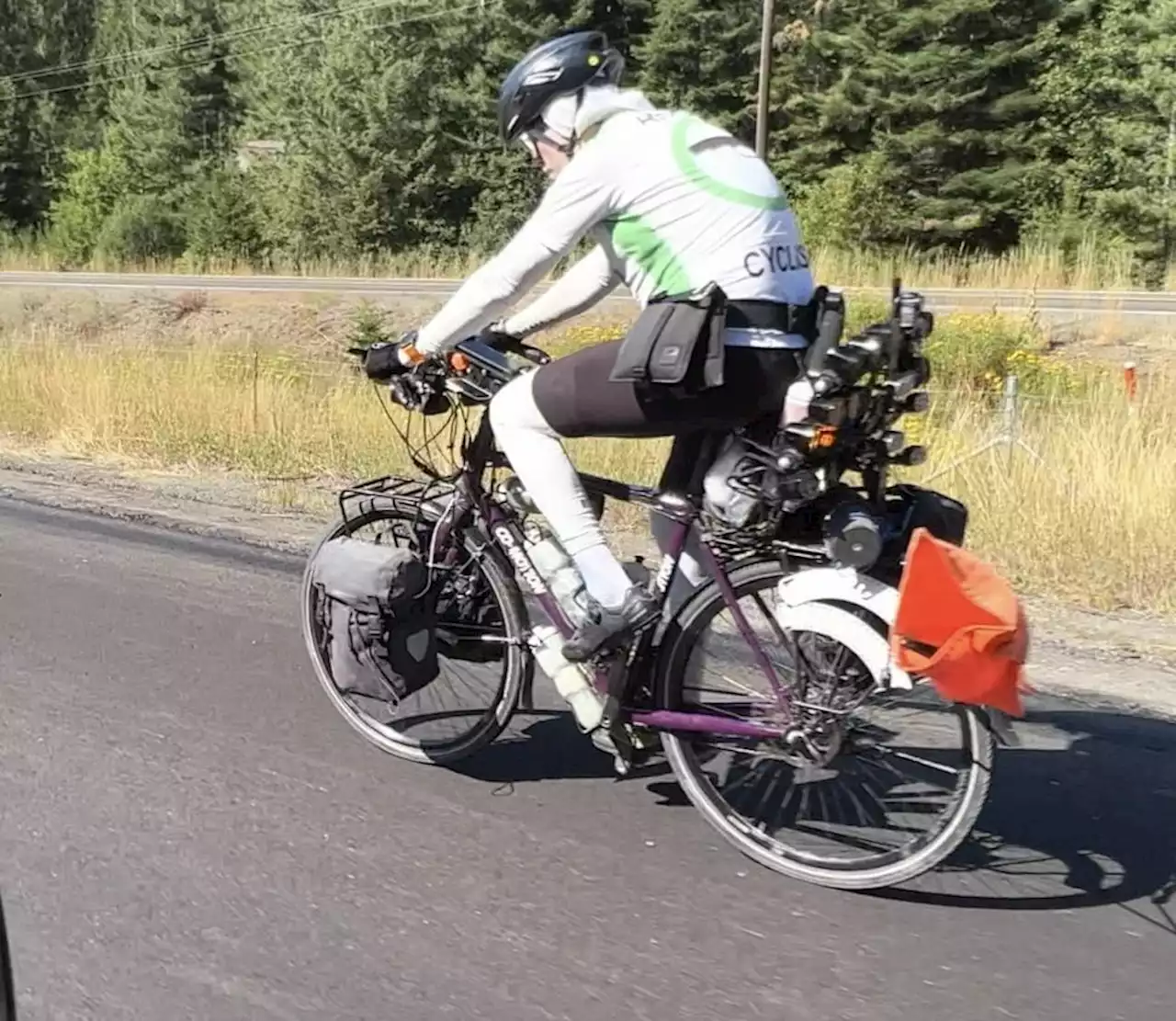 “How to stay alive as a cyclist in North America”: Florida man spotted riding with ‘Armed Cyclist’ jersey, close passing flags and countless bike lights sparks cycling safety discussions