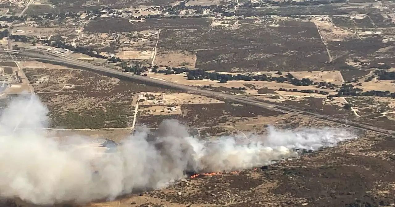 Vehicle fire sparks larger vegetation fire in Boulevard