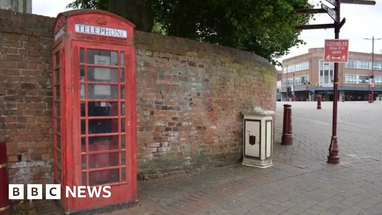 Anger as red phone box removed from market place