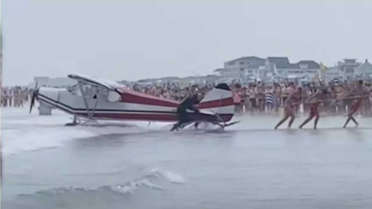 Video shows plane that crashed at New Hampshire beach being pulled out of waves