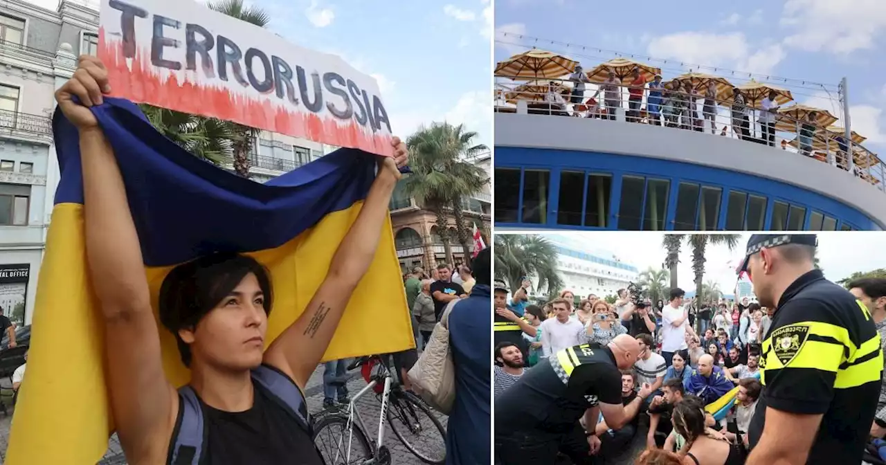 Moment Russian cruise ship is forced out of Georgia by anti-Putin protesters