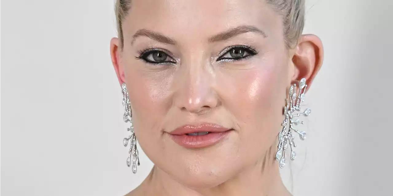 At 44, Kate Hudson Stuns in Plunging Gilded Minidress