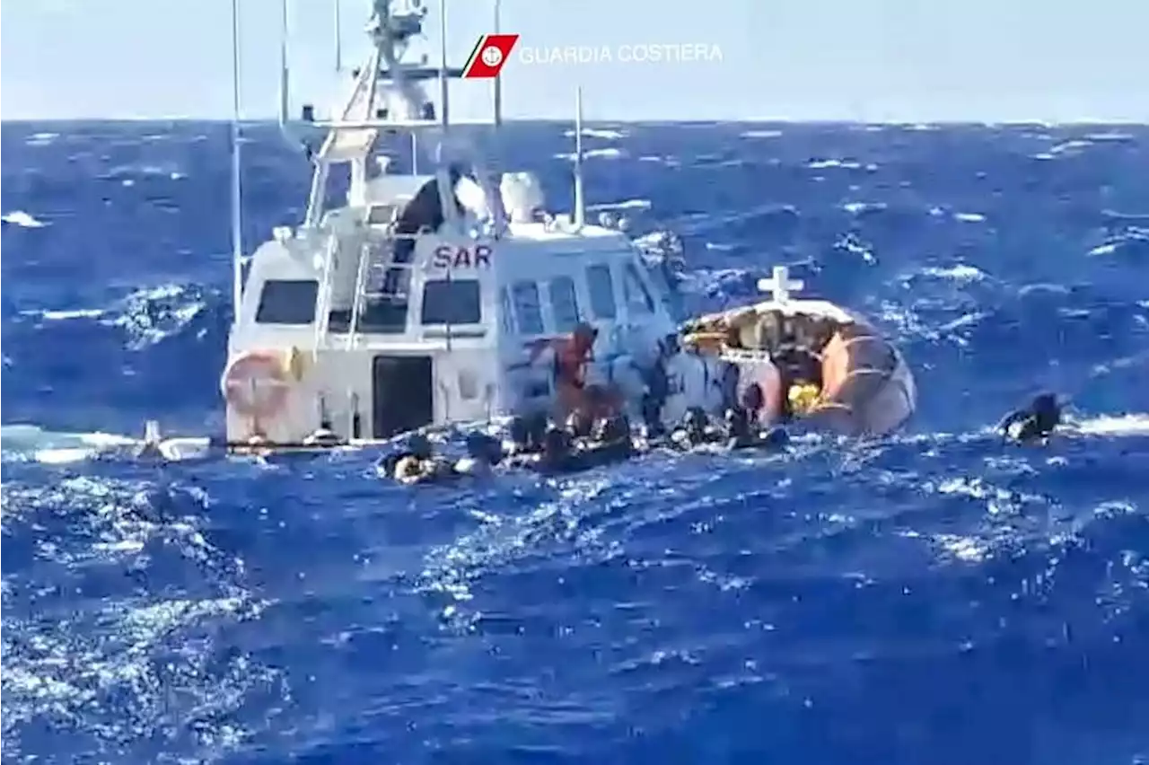 Stranded migrants saved, but dozens missing off Italy in rough seas