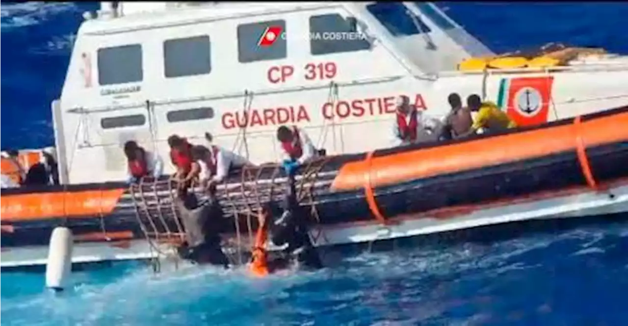 Stranded migrants saved, but dozens missing off Italy in rough seas