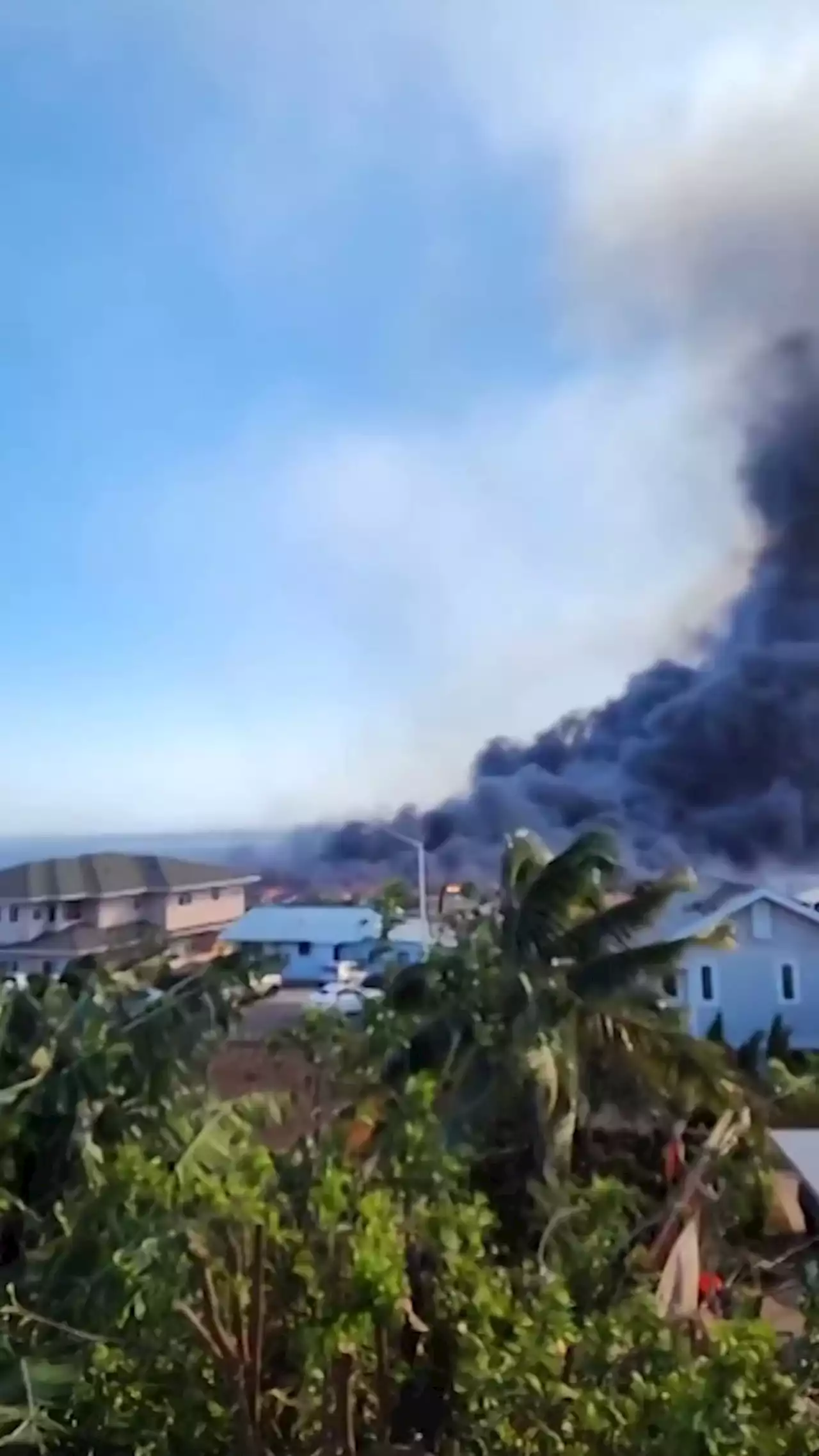 People Jump into Ocean to Escape Wildfires Fueled by Hurricane Dora