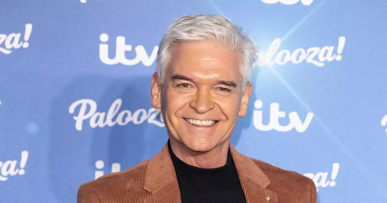 Phillip Schofield all smiles breaking cover to dine with Vanessa Feltz in London